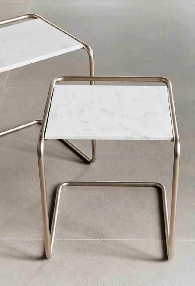 Detail shot for JS . THONET: B 97 nesting side table set with light marble tops and tubular steel frame.