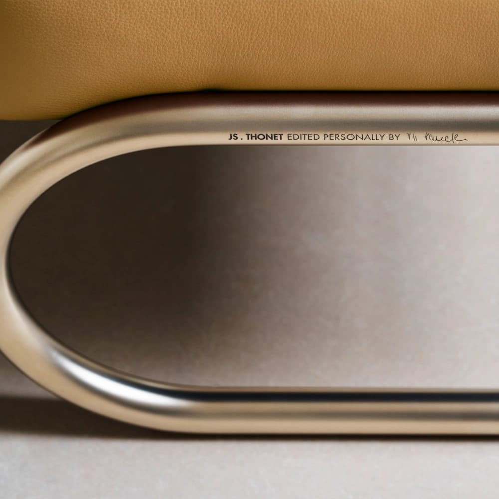 Detail shot for JS . THONET: engraved tubular steel frame reading “JS . THONET edited personally by Jil Sander”