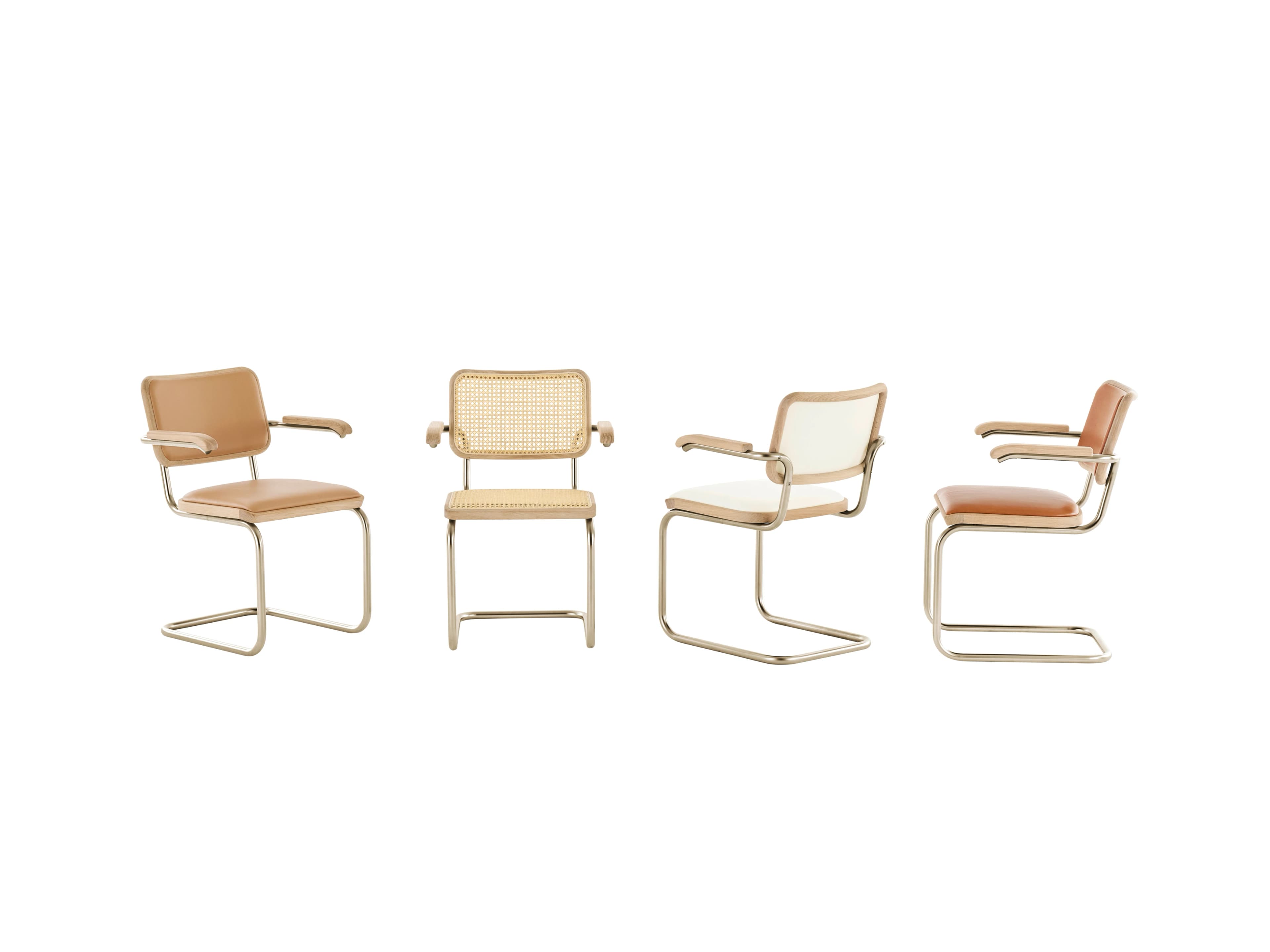 Thonet S 64 cantilever armchairs in the Nordic Edition – camel and cognac with leather upholstery, natural with Viennese cane and cream white with fabric – with gold-colored tubular steel frame, on a white background.